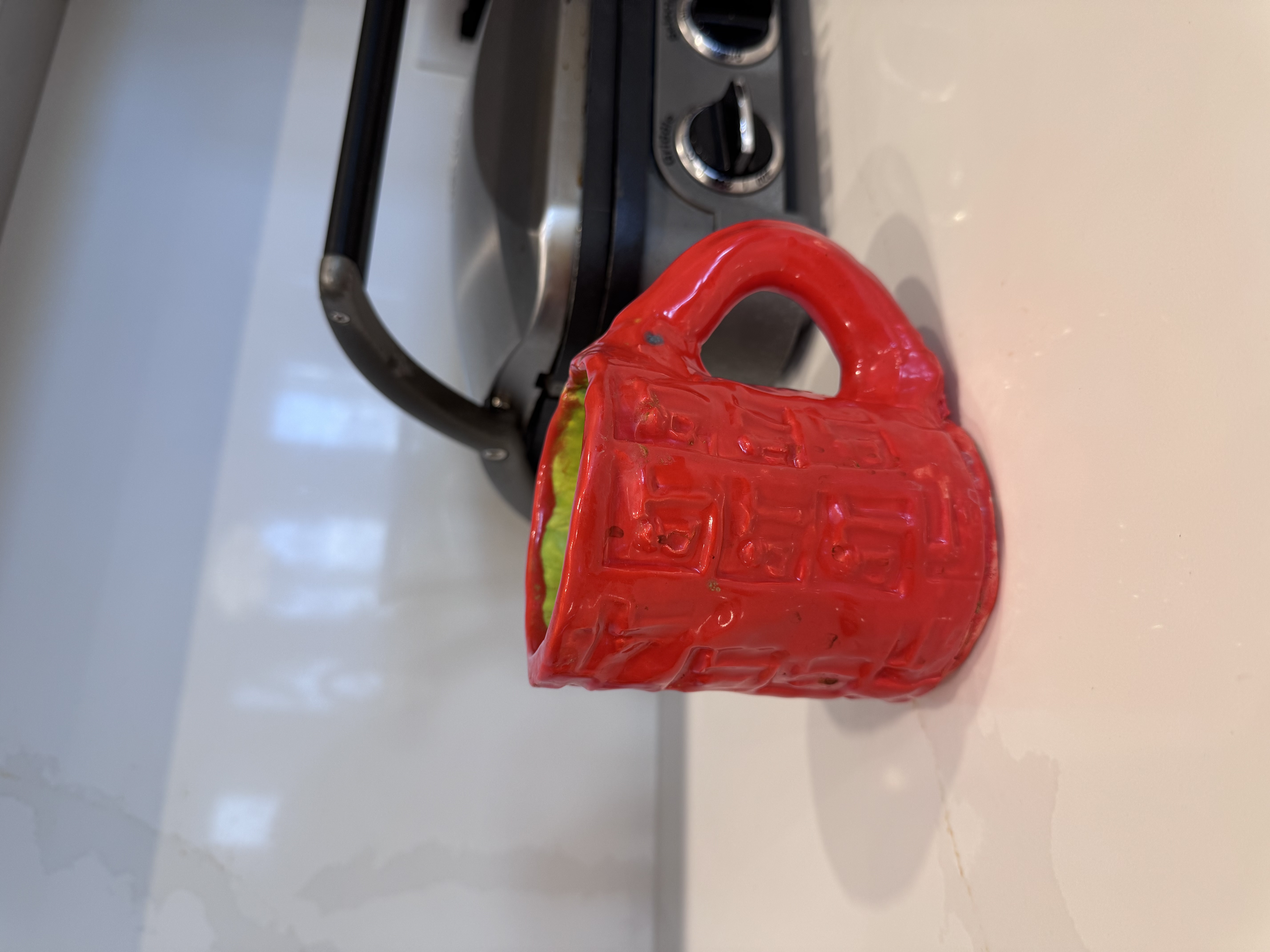 Handmade espresso mug with golden glaze